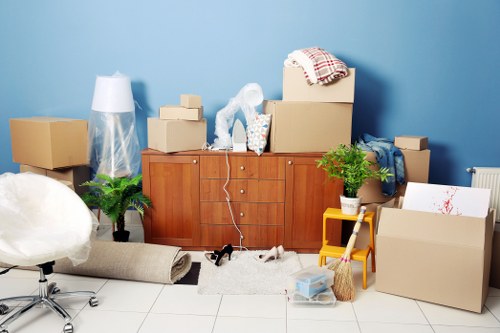 Professional movers handling furniture