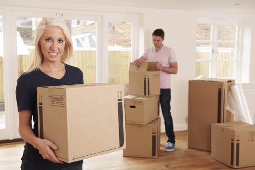 Professional movers handling furniture