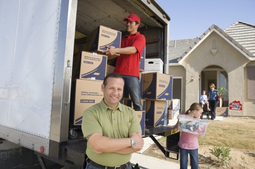 Packed boxes and furniture ready for transportation