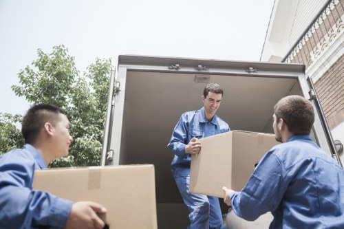 Experienced movers handling furniture