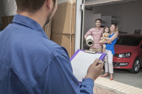 Clients shaking hands with movers