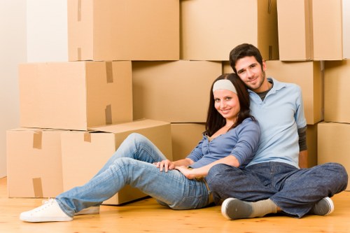 Packers carefully packing items for a move