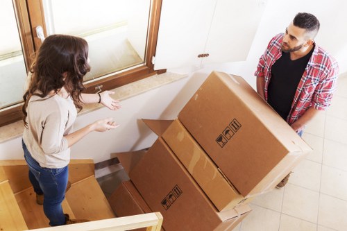 Mikes Man and Van team unloading furniture at a new home