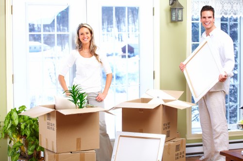 Mikes Man and Van team packing household items carefully